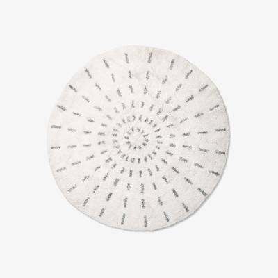 Nordic Nest Swirl bathroom rug Ø120 cm black and white