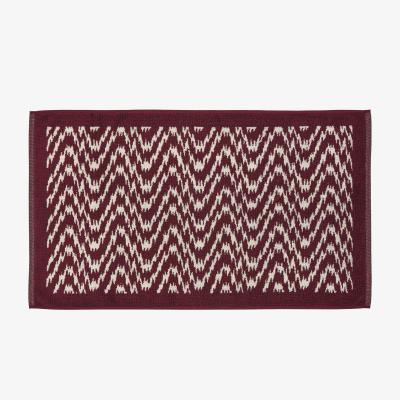 The Rug Seller Aris Bath Mat by Bedeck of Belfast in Mulberry Red90x50cm