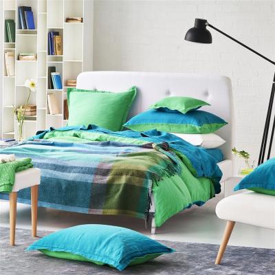 The Rug Seller Bampton Emerald Woven Throw in Emerald Green by Designers Guild&nbsp;190x130cm