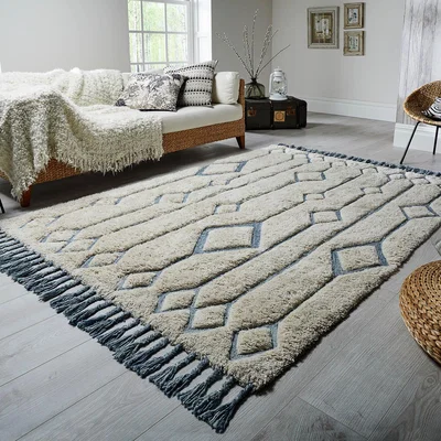 The Rug Seller Solitaire Sion rugs in Natural Duck Egg by Luxmi