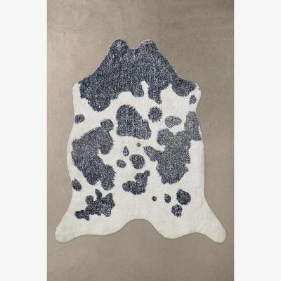 Urban Outfitters Cow Print Rug - Black/White 114.3cm x 83.8cm at Urban Outfitters