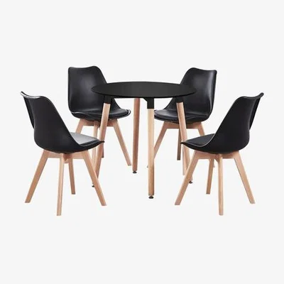 The Range Round Lorenzo Dining Set includes a Table and Dining Chairs Set of 4 - Black