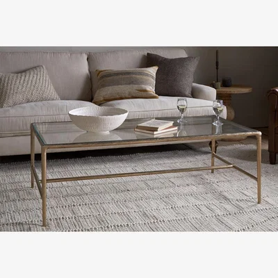 Nkuku nkuku Gilasi Cast Metal & Glass Coffee Table | Tables | Antique Brass