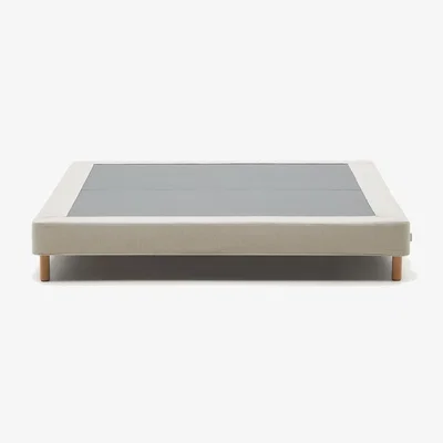 Kave Home Ofelia base with beige removable cover and solid beech wooden legs for a 180 x 200 cm mattress