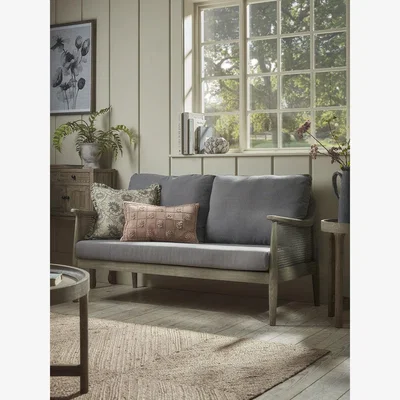 Cox and Cox Aged Wicker Sofa