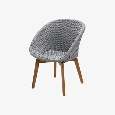 Olivia's Cane-line Peacock Light Grey Legs Outdoor Armchair