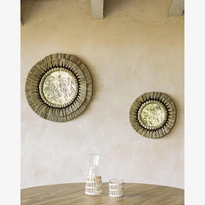 Kave Home Akila round mirror made from beige natural fibres and black cotton cord, 60 cm
