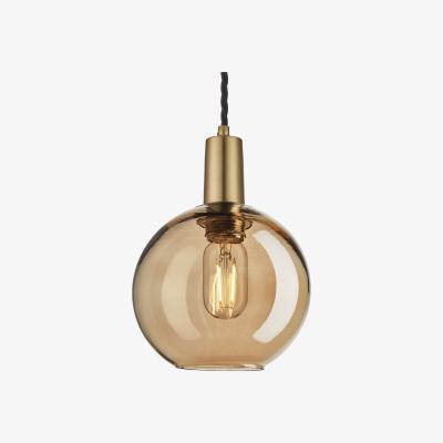 Olivia's Industville Sleek Tinted Glass Globe Amber Pendant / 7 Inch Brass Holder
